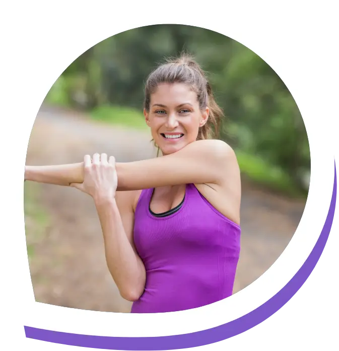 Woman stretching in park